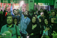 آیین سنتی نخل گردانی و عزاداری ظهر عاشورا در تکیه بزرگ تجریش