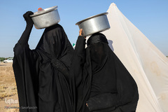 مراسم نمادین خاکسپاری شهدای کربلا در حمیدیه