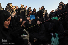 مراسم نمادین خاکسپاری شهدای کربلا در حمیدیه