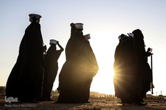 مراسم نمادین خاکسپاری شهدای کربلا در حمیدیه