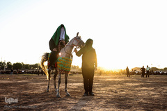 مراسم نمادین خاکسپاری شهدای کربلا در حمیدیه