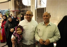 عبدالواحد سعیدی‌زاده در کنار شهید سعیدی‌زاده