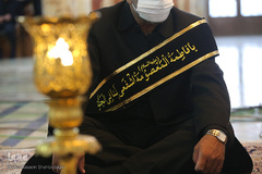 آیین تعویض پرچم و اقامه عزا در حرم حضرت معصومه(س)