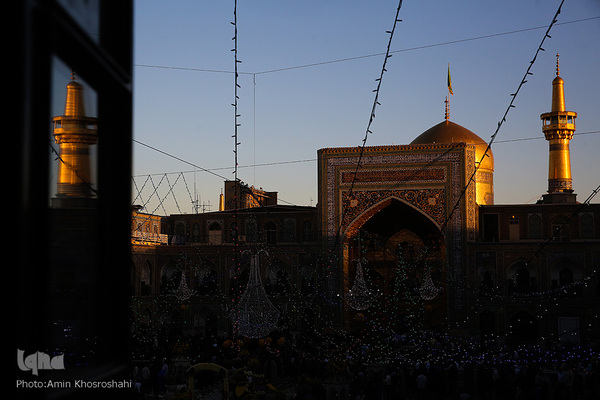 آئین تعویض پرچم گنبد حرم امام رضا(ع)