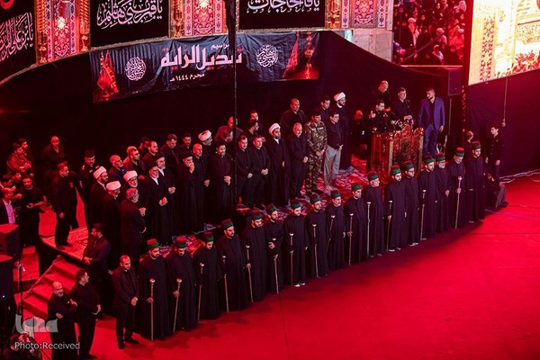 تعویض پرچم حرمین شریفین در کربلا به مناسبت فرارسیدن ماه محرم