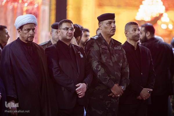 مراسم تعویض پرچم گنبد حرم حضرت اباالفضل العباس(ع) از قرمز به مشکی